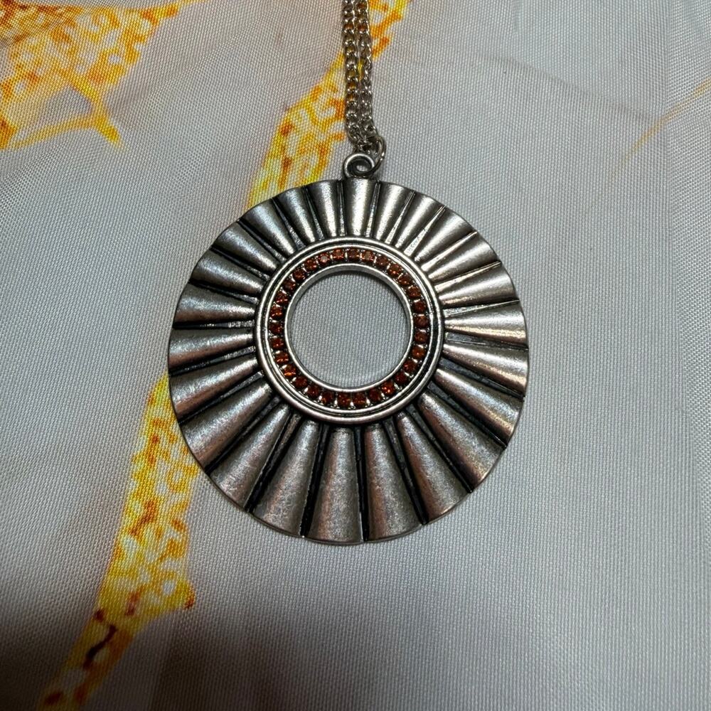 Silver Sunburst Pendant Necklace with Amber Rhinestones